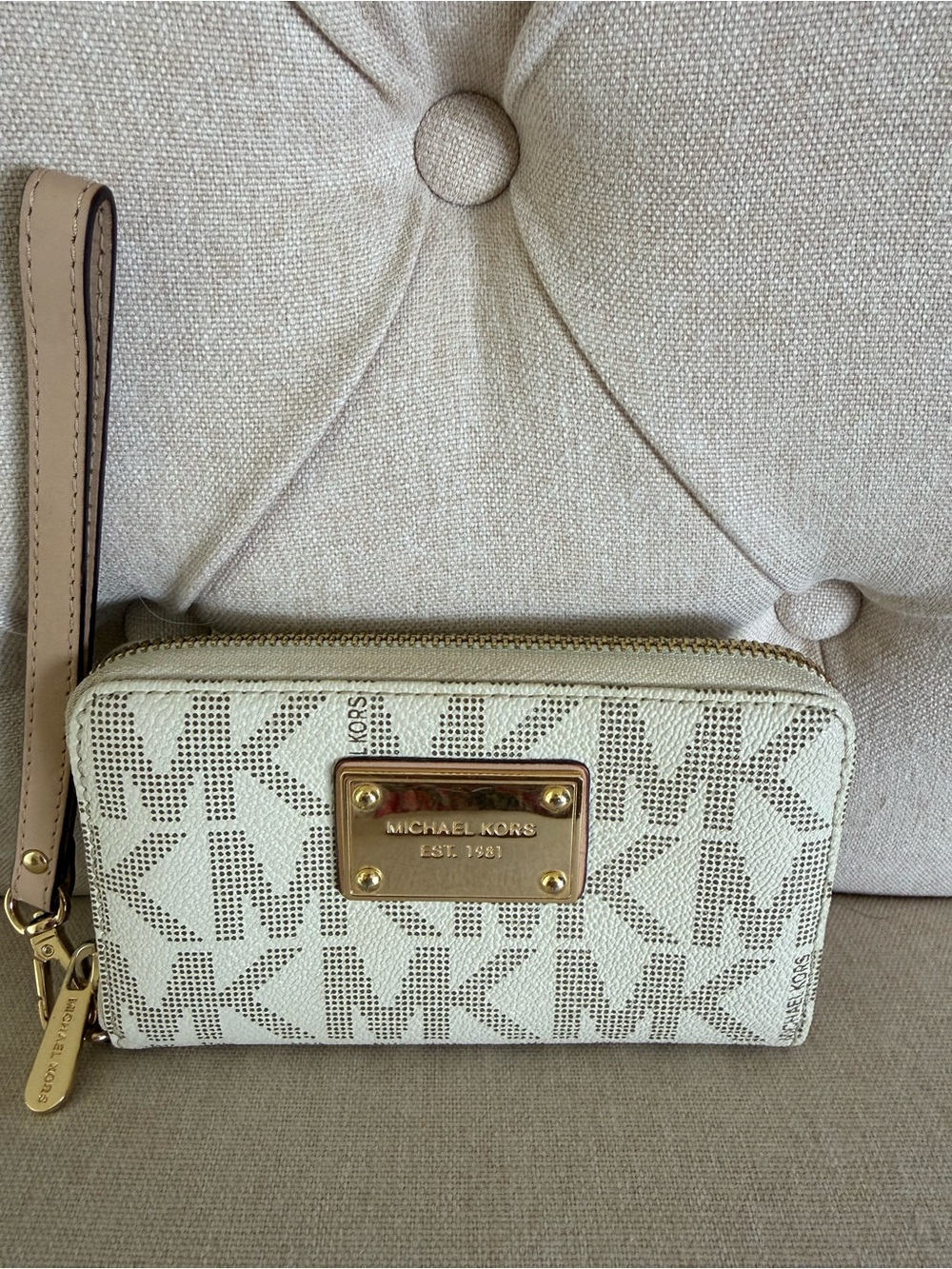 Michael Kors Cream Logo Wristlet with Gold Plate